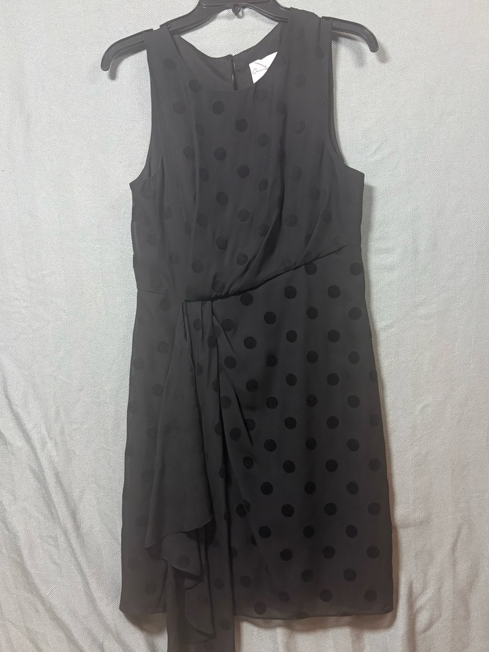 Black Polka Dot Sleeveless Mini Dress with Draped Accent